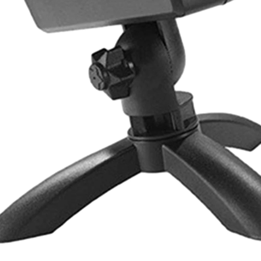 Black adjustable tripod stand on a white background