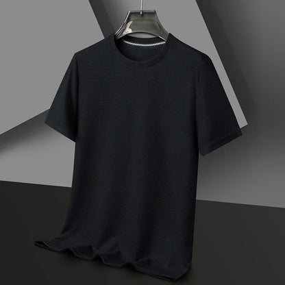 Black t-shirt on a hanger against a gray background
